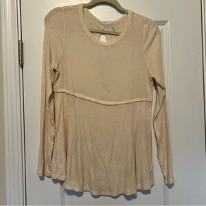 Cream Long Sleeve Blouse with Ribbed Peplum and Rounded Neckline